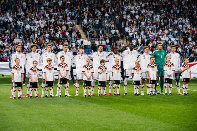 U21, U 21 EM-Qualifikation: Deutschland - Georgien, 06.10.2026 Deutschland bei der Hymne, Paris Brunner (Deutschland, 19), Noah Darvich (Deutschland, 17), Aljoscha Kemlein (Deutschland, 16), Dženan PejÄinović (Deutschland, 11), Nnamdi Collins (Deutschland, 20), Noel Aseko (Deutschland, 8), Joshua Quarshie (Deutschland, 5), Lukas Ullrich (Deutschland, 3), Elias Baum (Deutschland, 2), Mio Backhaus (Deutschland, 1), Nicolò Tresoldi (Deutschland, 9); Fußball, EM-Qualifikation U 21, 10. Spieltag: Deutschland vs. Georgien am 06.10.2026, Bielefeld DFB REGULATIONS PROHIBIT ANY USE OF PHOTOGRAPHS AS IMAGE SEQUENCES AND OR QUASI-VIDEO. Copyright: xBEAUTIFULxSPORTS Tonhäuserx