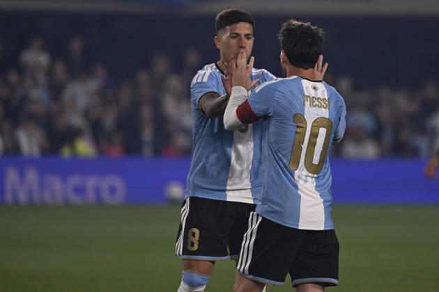 BUENOS AIRES, ARGENTINA - OCTOBER 06 : Forward Lionel Messi 10 of Argentina high-fives teammate Enzo Fernandez 8 during an International Friendly, Länderspiel, Nationalmannschaft match against Benin at Estadio Monumental on October 06, 2026 in Buenos Aires, Argentina. This historic match marks the final international appearance who wore a commemorative special-edition kit replacing the traditional manufacturer branding with his personal signature logo. Photo by SFSI Argentina national team, Nationalteam v Benin Copyright: xSFSIx