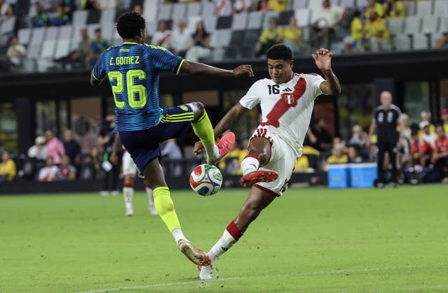International soccer friendly - Colombia vs. Peru Colombia forward Carlos Andres Gomez (L) in action against Peru midfielder Wilder Cartagena (R) during the international soccer friendly between Colombia and Peru at Nu Stadium in Miami, Florida, USA, 06 October 2026. MIAMI FLORIDA United States Copyright: xCRISTOBALxHERRERA-ULASHKEVICHx