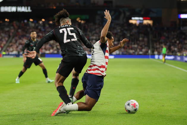 SAINT PAUL, MN - OCTOBER 06: Canada™s Nathan Saliba (25) fouls United States Tyler Adams (4) during the second half of the men™s friendly match between the U.S. national team, Nationalteam and Canada™s national team on October 6th, 2026, at Allianz Field in Saint Paul, MN. (Photo by Bailey Hillesheim Icon Sportswire) SOCCER: OCT 06 USA vs Canada EDITORIAL USE ONLY Icon20261006021