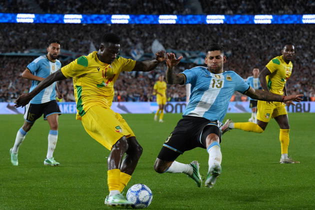 Messi bade farewell to Argentina in the friendly match against Benin BUENOS AIRES, ARGENTINA - OCTOBER 6: Cristian Romero (13) of Argentina in action during the friendly match between Argentina and Benin in Buenos Aires, Argentina on October 6, 2026. Argentine football legend and national team, Nationalteam captain Lionel Messi goodbye to the crowd during his farewell match in front of over 80,000 spectators at the Monumental Stadium. Argentine football star Lionel Messi played his final international match, Länderspiel, Nationalmannschaft in the friendly game between Argentina and Benin. The 39-year-old walk onto the stadium pitch for the final time in the sky-blue and white jersey, entering his farewell as Argentina s record appearance-maker and leading scorer with 207 caps and 125 goals. Luciano Gonzalez Anadolu Buenos Aires Argentina. Editorial use only. Please get in touch for any other usage.  Copyright: x2026xAnadoluxLucianoxGonzalezx