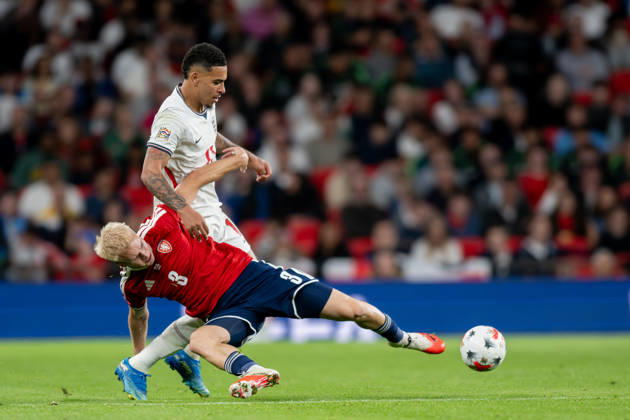 Morgan Rogers of England and Aindrej Zmrzly of Czechia challenge for the ball during the Nations League match between England and Czechia at Wembley Stadium, London, England on 6 October 2026. Copyright: xPhilxHutchinsonx 45480082