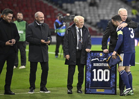 Glasgow, Scotland, 6th October 2026. Scotland head coach, Sebastien Pocognoli with former Scotland & Andy Robertsons managers Steve Clarke, Gordon Strachan and Alex McLeish wait to present a framed shiirt to mark Roberstons 100 cap during the Scotland vs Slovenia UEFA Nations League match at Hampden Park, Glasgow. Picture credit should read: Neil Hanna Sportimage EDITORIAL USE ONLY. No use with unauthorised audio, video, data, fixture lists, club league logos or live services. Online in-match use limited to 120 images, no video emulation. No use in betting, games or single club league player publications. SPI_091_NH_Scotland_Slovenia SPI-5054-0091
