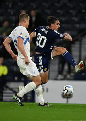 Glasgow, Scotland, 6th October 2026. Jaka Bijol of Slovenia and Kieron Bowie of Scotland during the Scotland vs Slovenia UEFA Nations League match at Hampden Park, Glasgow. Picture credit should read: Neil Hanna Sportimage EDITORIAL USE ONLY. No use with unauthorised audio, video, data, fixture lists, club league logos or live services. Online in-match use limited to 120 images, no video emulation. No use in betting, games or single club league player publications. SPI_085_NH_Scotland_Slovenia SPI-5054-0085