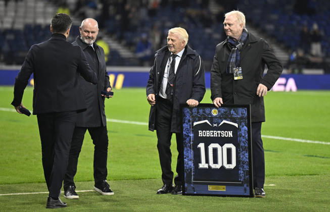 Glasgow, Scotland, 6th October 2026. Scotland head coach, Sebastien Pocognoli with former Scotland & Andy Robertsons managers Steve Clarke, Gordon Strachan and Alex McLeish wait to present a framed shiirt to mark Roberstons 100 cap during the Scotland vs Slovenia UEFA Nations League match at Hampden Park, Glasgow. Picture credit should read: Neil Hanna Sportimage EDITORIAL USE ONLY. No use with unauthorised audio, video, data, fixture lists, club league logos or live services. Online in-match use limited to 120 images, no video emulation. No use in betting, games or single club league player publications. SPI_087_NH_Scotland_Slovenia SPI-5054-0087