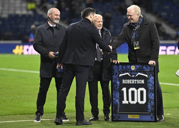 Glasgow, Scotland, 6th October 2026. Scotland head coach, Sebastien Pocognoli with former Scotland & Andy Robertsons managers Steve Clarke, Gordon Strachan and Alex McLeish wait to present a framed shiirt to mark Roberstons 100 cap during the Scotland vs Slovenia UEFA Nations League match at Hampden Park, Glasgow. Picture credit should read: Neil Hanna Sportimage EDITORIAL USE ONLY. No use with unauthorised audio, video, data, fixture lists, club league logos or live services. Online in-match use limited to 120 images, no video emulation. No use in betting, games or single club league player publications. SPI_089_NH_Scotland_Slovenia SPI-5054-0089