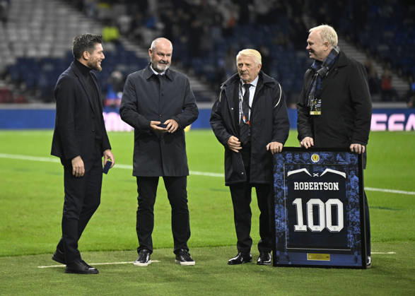 Glasgow, Scotland, 6th October 2026. Scotland head coach, Sebastien Pocognoli with former Scotland & Andy Robertsons managers Steve Clarke, Gordon Strachan and Alex McLeish wait to present a framed shiirt to mark Roberstons 100 cap during the Scotland vs Slovenia UEFA Nations League match at Hampden Park, Glasgow. Picture credit should read: Neil Hanna Sportimage EDITORIAL USE ONLY. No use with unauthorised audio, video, data, fixture lists, club league logos or live services. Online in-match use limited to 120 images, no video emulation. No use in betting, games or single club league player publications. SPI_090_NH_Scotland_Slovenia SPI-5054-0090