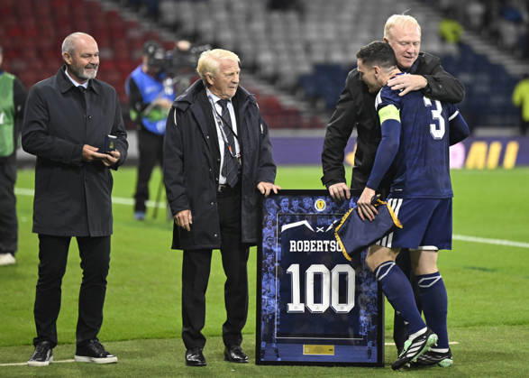 Glasgow, Scotland, 6th October 2026. Scotland head coach, Sebastien Pocognoli with former Scotland & Andy Robertsons managers Steve Clarke, Gordon Strachan and Alex McLeish wait to present a framed shiirt to mark Roberstons 100 cap during the Scotland vs Slovenia UEFA Nations League match at Hampden Park, Glasgow. Picture credit should read: Neil Hanna Sportimage EDITORIAL USE ONLY. No use with unauthorised audio, video, data, fixture lists, club league logos or live services. Online in-match use limited to 120 images, no video emulation. No use in betting, games or single club league player publications. SPI_092_NH_Scotland_Slovenia SPI-5054-0092