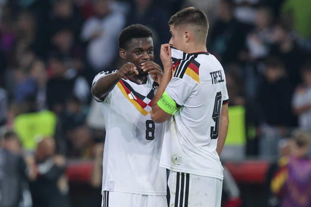 Noel Aseko (Germany) und Nicolo Tresoldi (Germany) talk together during the UEFA Under21 EURO Qualifier, EM, Europameisterschaft between Germany U21, U 21 and Georgia U21 at Almstadion on October 6, 2026 in Bielefeld, Germany. (Photo by Marco Steinbrenner DeFodi Images) -