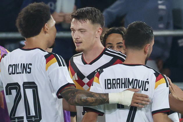 Dzenan Pejcinovic (Germany) celebrates after scoring his teams second goal with Nnamdi Collins (Germany) and Arijon Ibrahimovic (Germany) during the UEFA Under21 EURO Qualifier, EM, Europameisterschaft between Germany U21, U 21 and Georgia U21 at Almstadion on October 6, 2026 in Bielefeld, Germany. (Photo by Marco Steinbrenner DeFodi Images) -