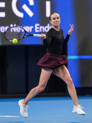 (261007) -- BEIJING, Oct. 7, 2026 -- Elina Svitolina of Ukraine hits a return during the women s singles round of 16 match against Ann Li of the United States at 2026 China Open tennis tournament in Beijing, China, Oct. 7, 2026. ) (SP)CHINA-BEIJING-TENNIS-CHINA OPEN-WOMEN S SINGLES (CN) SunxFei