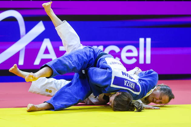 AZERBAIJAN, BAKU - OCTOBER 7, 2026: Anna Kriza (front) of Hugary and Renata Zachova of the Czech Republic compete in their -63 kg bout as part of the 2026 World Judo Championships at the National Gymnastics Arena. Mikhail Sinitsyn TASS 98913093