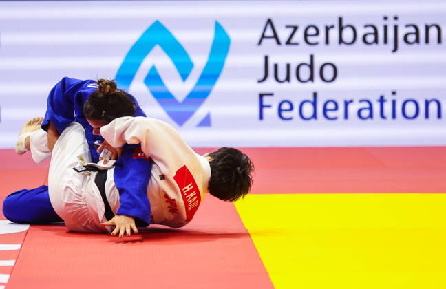 AZERBAIJAN, BAKU - OCTOBER 7, 2026: Kerem Primo (L) of Israel and Haruka Kaju of Japan compete in a -63 kg bout as part of the 2026 World Judo Championships at the National Gymnastics Arena 2026 World Judo Championships In Baku - ZUMAt113 20261007_zaa_t113_417 Copyright: xMikhailxSinitsynx