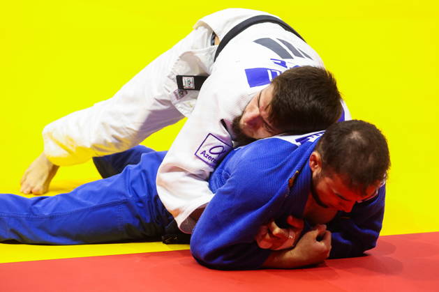 AZERBAIJAN, BAKU - OCTOBER 7, 2026: Omar Radzhabli (top) of Azerbaijan and Abylaikhan Zhubanazar of Kazakhstan compete in their -81 kg bout as part of the 2026 World Judo Championships at the National Gymnastics Arena. Mikhail Sinitsyn TASS 98915128