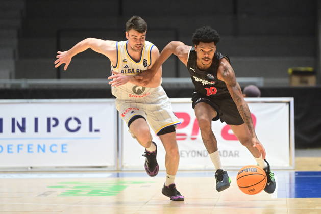 Men s basketball Champions League, group G, 1st round, match Slavia Praha NBK and Alba Berlin in Pardubice, Czech Republic, October 7, 2026. From left Jonas Mattisseck of Berlin, Ronaldo Segu of Slavia Praha NBK. (CTKxPhoto JosefxVostarek) CTKPhotoP2026100707158 CTKPhotoP2026100707158