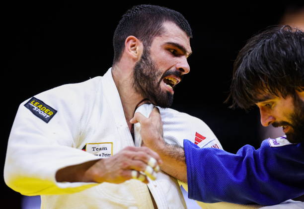AZERBAIJAN, BAKU - OCTOBER 7, 2026: Zelim Tckaev (L) of Azerbaijan and Tato Grigalashvili of Georgia compete in their -81 kg bout as part of the 2026 World Judo Championships at the National Gymnastics Arena. Mikhail Sinitsyn TASS 98916224