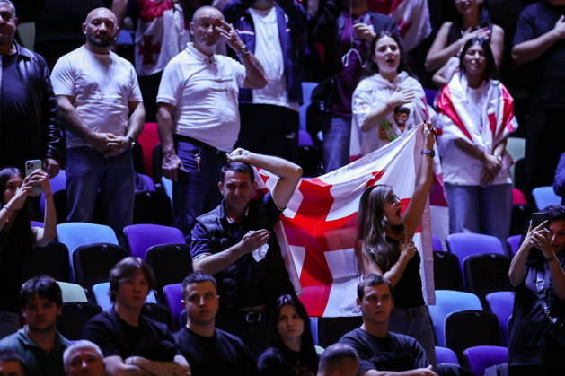 AZERBAIJAN, BAKU - OCTOBER 7, 2026: Members of the audience during an award ceremony for the men s -81 kg category, won by Tato Grigalashvili of Georgia, as part of the 2026 World Judo Championships at the National Gymnastics Arena. Mikhail Sinitsyn TASS 98916609