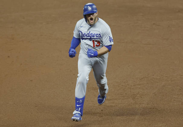 Los Angeles Dodgers Max Muncy (13) runs the bases after hitting a solo home run in the ninth inning against the Atlanta Braves in an MLB, Baseball Herren, USA National League Division Series playoff game at Truist Park in Atlanta, Georgia, on Wednesday, October 7, 2026. The Dodgers defeated the Braves 4-1 to win the series 3 games to 1 and advance to the Championship round. ATL20261007724 MIKExZARRILLI