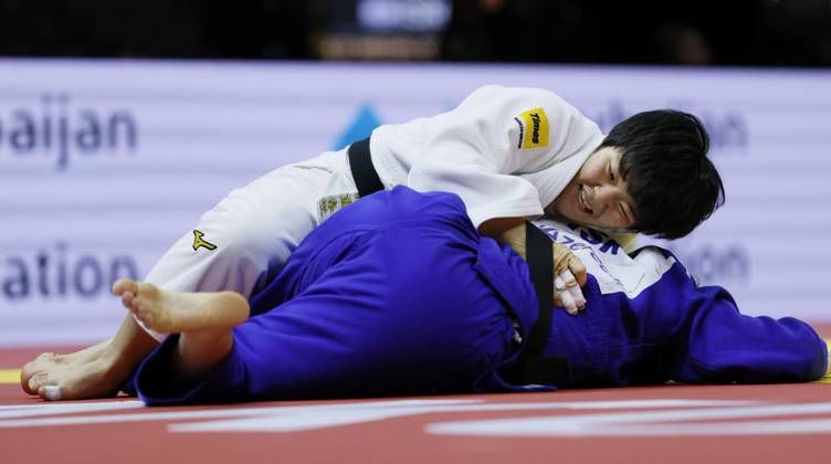 Judo: World championships Haruka Kaju (white) of Japan competes en route to beating Kerem Primo of Israel in the women s 63-kilogram final at the judo world championships in Baku, Azerbaijan, on Oct. 7, 2026.  A14AA0005630394P