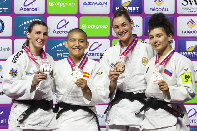 AZERBAIJAN, BAKU - OCTOBER 8, 2026: 2nd placed Giovanna Scoccimarro of Germany, 1st placed Ai Tsunoda Roustant of Spain, 3rd placed Michaela Polleres of Austria and Madina Taimazova (L-R) of Russia pose during an award ceremony for the women s -70 kg category during the 2026 World Judo Championships at the National Gymnastics Arena. Mikhail Sinitsyn TASS 98956128
