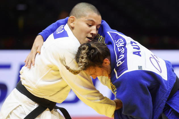 AZERBAIJAN, BAKU - OCTOBER 8, 2026: Ai Tsunoda Roustant (L) of Spain and Michaela Polleres of Austria compete in their -70 kg bout as part of the 2026 World Judo Championships at the National Gymnastics Arena. Mikhail Sinitsyn TASS 98957473