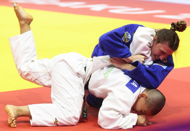 AZERBAIJAN, BAKU - OCTOBER 8, 2026: Michaela Polleres (top) of Austria and Ai Tsunoda Roustant of Spain compete in their -70 kg bout as part of the 2026 World Judo Championships at the National Gymnastics Arena. Mikhail Sinitsyn TASS 98957471