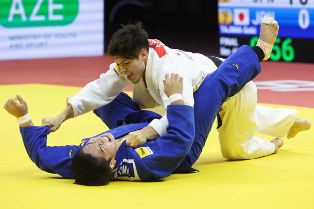 AZERBAIJAN, BAKU - OCTOBER 8, 2026: Sanshiro Murao (top) of Japan and Goki Tajima of Japan compete in their -90 kg bout as part of the 2026 World Judo Championships at the National Gymnastics Arena. Mikhail Sinitsyn TASS 98959055