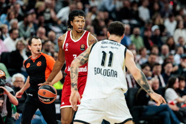 MUNICH, GERMANY - OCTOBER 08: Marjon Beauchamp (FC Bayern Muenchen, 3) controls the ball against Tommaso Baldasso (Virtus Bologna, 11) during the Turkish Airlines EuroLeague match between FC Bayern Muenchen vs. Virtus Bologna at SAP Garden on round 4 of Turkish Airlines EuroLeague on October 08, 2026 in Munich, Germany. Bavaria Germany Copyright: xSteffiexWunderlx