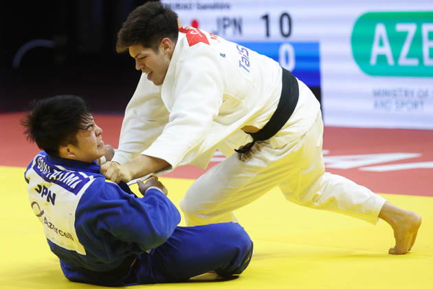 AZERBAIJAN, BAKU - OCTOBER 8, 2026: Sanshiro Murao (top) of Japan and Goki Tajima of Japan compete in their -90 kg bout as part of the 2026 World Judo Championships at the National Gymnastics Arena 2026 World Judo Championships In Baku - ZUMAt113 20261008_zaa_t113_725 Copyright: xMikhailxSinitsynx