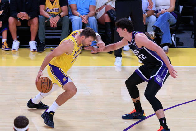 October 8, 2026, Los Angeles, California, USA: Luka Doncic 77 of the Los Angeles Lakers drives against Maxime Raynaud 42 of the Sacramento Kings during a preseason NBA, Basketball Herren, USA game on Thursday October 8, 2026 at Crypto.com Arena in Los Angeles, California. JAVIER ROJAS PI Los Angeles USA - ZUMAp124 20261008_zaa_p124_004 Copyright: xJavierxRojasx