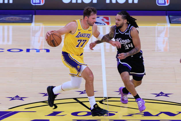 October 8, 2026, Los Angeles, California, USA: Luka Doncic 77 of the Los Angeles Lakers is defended by Emanuel Sharp 34 of the Sacramento Kings during a preseason NBA, Basketball Herren, USA game on Thursday October 8, 2026 at Crypto.com Arena in Los Angeles, California. JAVIER ROJAS PI Lakers Vs. Kings  - ZUMAp124 20261008_zaa_p124_007 Copyright: xJavierxRojasx