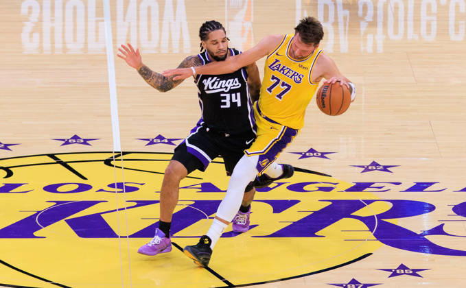 October 8, 2026, Los Angeles, California, USA: Luka Doncic 77 of the Los Angeles Lakers is fouled by Emanuel Sharp 34 of the Sacramento Kings during a preseason NBA, Basketball Herren, USA game on Thursday October 8, 2026 at Crypto.com Arena in Los Angeles, California. JAVIER ROJAS PI Lakers Vs. Kings  - ZUMAp124 20261008_zaa_p124_020 Copyright: xJavierxRojasx