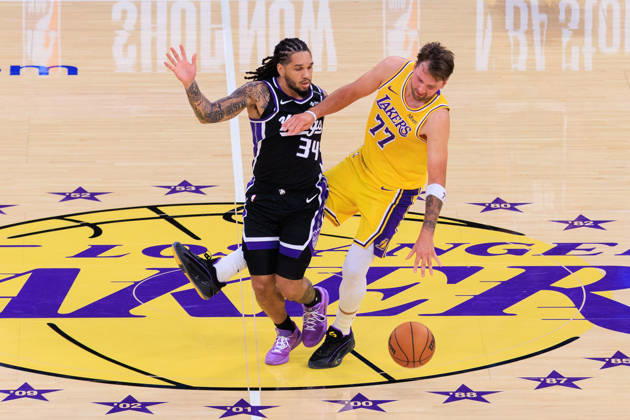 October 8, 2026, Los Angeles, California, USA: Luka Doncic 77 of the Los Angeles Lakers is fouled by Emanuel Sharp 34 of the Sacramento Kings during a preseason NBA, Basketball Herren, USA game on Thursday October 8, 2026 at Crypto.com Arena in Los Angeles, California. JAVIER ROJAS PI Lakers Vs. Kings  - ZUMAp124 20261008_zaa_p124_021 Copyright: xJavierxRojasx