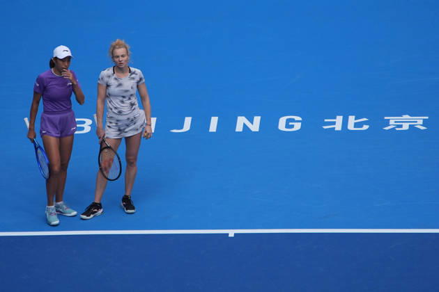 (261009) -- BEIJING, Oct. 9, 2026 -- Katerina Siniakova (R) Zhang Shuai react during the women s doubles quarterfinal match between Katerina Siniakova (the Cezch Republic) Zhang Shuai (China) and Storm Hunter (Australia) Kristina Mladenovic (France) at 2026 China Open tennis tournament in Beijing, China, Oct. 9, 2026. ) (SP)CHINA-BEIJING-TENNIS-CHINA OPEN-WOMEN S DOUBLES (CN) XiexHan 
