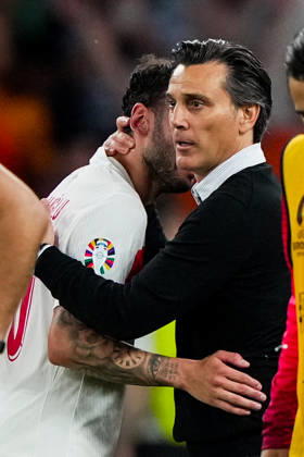 Turkey s Hakan Calhanoglu and Turkey s head coach Vincenzo Montella during the Euro 2024 soccer match between Netherlands and Turkey at the Berlin Olympiastadion , Berlin, Germany - Saturday 06 july 2024. - Soccer . Copyright: xSpada LaPressex