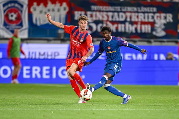Jan Schoeppner (1. FC Heidenheim 1846) und Ibrahim KanatÃ (1. FC Kaiserslautern) im Zweikampf waehrend des spiels der 2. Bundesliga zwischen 1. FC Heidenheim und 1. FC Kaiserslautern, Voith-Arena am 09. October 2026 in Heidenheim an der Brenz, Deutschland. (Foto von Harry Langer DeFodi Images) +++ Jan Schoeppner (1. FC Heidenheim 1846) und Ibrahim KanatÃ (1. FC Kaiserslautern) battle for the ball during the 2nd Bundesliga match between 1. FC Heidenheim and 1. FC Kaiserslautern at Voith-Arena on October 9, 2026 in Heidenheim an der Brenz, Germany. (Photo by Harry Langer DeFodi Images) DFB DFL REGULATIONS PROHIBIT ANY USE OF PHOTOGRAPHS AS IMAGE SEQUENCES AND OR QUASI-VIDEO. (Photo by Harry Langer DeFodi Images) DFB DFL REGULATIONS PROHIBIT ANY USE OF PHOTOGRAPHS AS IMAGE SEQUENCES AND OR QUASI-VIDEO. -