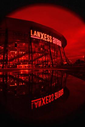 COLOGNE, GERMANY - 9 OCTOBER, 2026: (Editor note: used red filter) General view of Lanxes Arena - The PENNY DEL Ice hockey, Eishockey match Koelner Haie vs. Schwenninger Wild Wings at LANXESS arena. Copyright: xVitaliixKliuievx