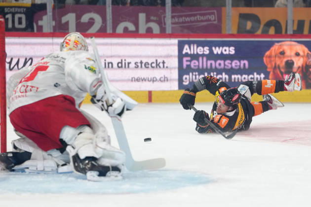 3014 Bern BE, Switzerland - October 09: Rodwin Dionicio (4 SCB) with a shoot while he falls on the ice during the National League match between SC Bern and EHC Biel-Bienne at PostFinance Arena on October 09, 2026 in 3014 Bern BE, Switzerland. Copyright: xKjetilxWaberx xSPPx Sportspressphoto_SPR249602