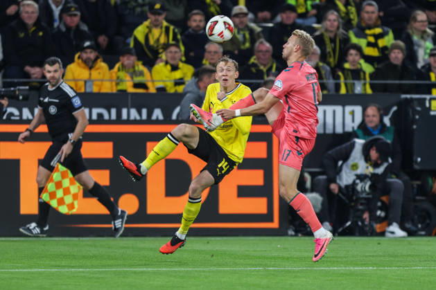 Fußball 1. Bundesliga 5. Spieltag Borussia Dortmund - SV Werder Bremen am 09.10.2026 im Signal Iduna Park in Dortmund Maximilian Beier ( Dortmund ), links - Marco Grüll ( Bremen ), rechts DFL regulations prohibit any use of photographs as image sequences and or quasi-video.