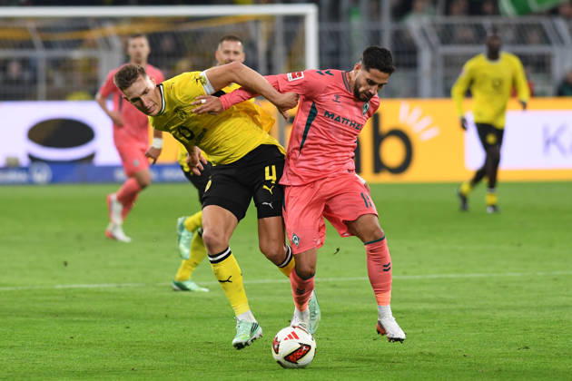 Nico Schlotterbeck (Borussia Dortmund) und Ludovic Reis (Werder Bremen) im Zweikampf waehrend des Spiels der 1. Bundesliga zwischen Borussia Dortmund und SV Werder Bremen, Signal Iduna Park am 09. October 2026 in Dortmund, Deutschland. (Foto von Ralf Treese DeFodi Images) +++ Nico Schlotterbeck (Borussia Dortmund) und Ludovic Reis (Werder Bremen) battle for the ball during the Bundesliga match between Borussia Dortmund and SV Werder Bremen at Signal Iduna Park on October 9, 2026 in Dortmund, Germany. (Photo by Ralf Treese DeFodi Images) DFB DFL REGULATIONS PROHIBIT ANY USE OF PHOTOGRAPHS AS IMAGE SEQUENCES AND OR QUASI-VIDEO. (Photo by Ralf Treese DeFodi Images) -