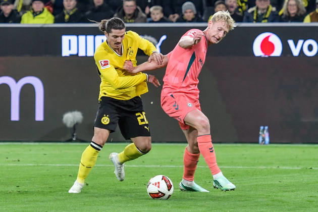 v. li. im Zweikampf Marcel Sabitzer (Dortmund 20) Justin Njinmah (Bremen 11) 09.10.2026 ¢ Fussball ¢ Borussia Dortmund vs SV Werder Bremen, Signal Iduna Park, Dortmund, DFB DFL REGULATIONS PROHIBIT ANY USE OF PHOTOGRAPHS AS IMAGE SEQUENCES AND OR QUASI-VIDEO NRW Germany