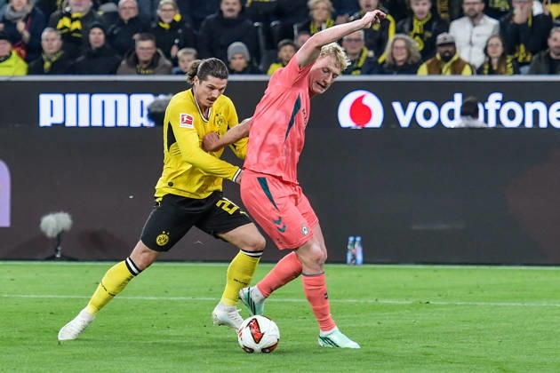 v. li. im Zweikampf Marcel Sabitzer (Dortmund 20) Justin Njinmah (Bremen 11) 09.10.2026 ¢ Fussball ¢ Borussia Dortmund vs SV Werder Bremen, Signal Iduna Park, Dortmund, DFB DFL REGULATIONS PROHIBIT ANY USE OF PHOTOGRAPHS AS IMAGE SEQUENCES AND OR QUASI-VIDEO NRW Germany