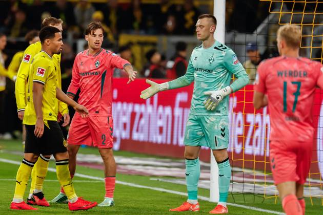 DORTMUND - Olivier Deman of Werder Bremen and Goalkeeper Karl Hein of Werder Bremen during the Bundesliga match between Borussia Dortmund and SV Werder Bremen at Signal Iduna Park on October 9, 2026 in Dortmund, Germany. MARCEL TER BALS ANP Bundesliga 2026 27 xVIxANPxSportx xMarcelxterxBalsxIVx 571970005 originalFilename: 571970005.jpg