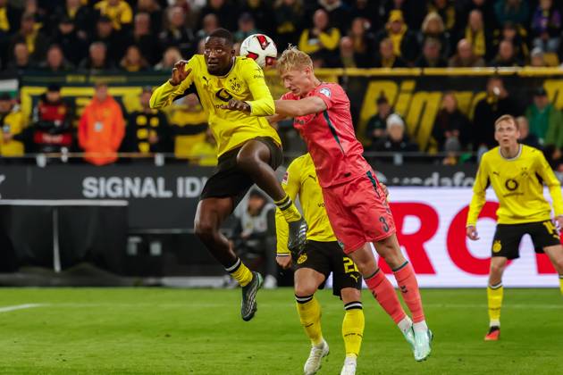 DORTMUND - Serhou Guirassy of Borussia Dortmund and Oskar Wojcik of Werder Bremen during the Bundesliga match between Borussia Dortmund and SV Werder Bremen at Signal Iduna Park on 09 October 2026 in Dortmund, Germany. MARCEL TER BALS ANP Bundesliga 2026 27 xVIxANPxSportx xMarcelxterxBalsxIVx 571970673 originalFilename: 571970673.jpg