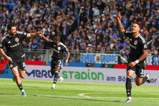 2026.10.10 Fussball 2.Bundesliga SV Darmstadt 98 - Energie Cottbus v.l., Tolcay Cigereci (Energie Cottbus) and Justin Butler (Energie Cottbus) seen celebrating after scoring goal to 0:1 Copyright: HMBxMedia JoaquimxFerreira