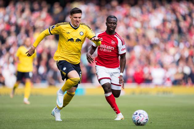 Bukayo Saka of Arsenal and Tarik Muharemovic of Leeds United battle for possession Arsenal v Leeds United, Premier League, Football, Emirates Stadium, London, UK - 10 Oct 2026London Emirates Stadium United Kingdom EDITORIAL USE ONLY No use with unauthorised audio, video, data, fixture lists, club league logos or live services. Online in-match use limited to 120 images, no video emulation. No use in betting, games or single club league player publications.  Copyright: xWiredxPhotos Shutterstockx 17204325v