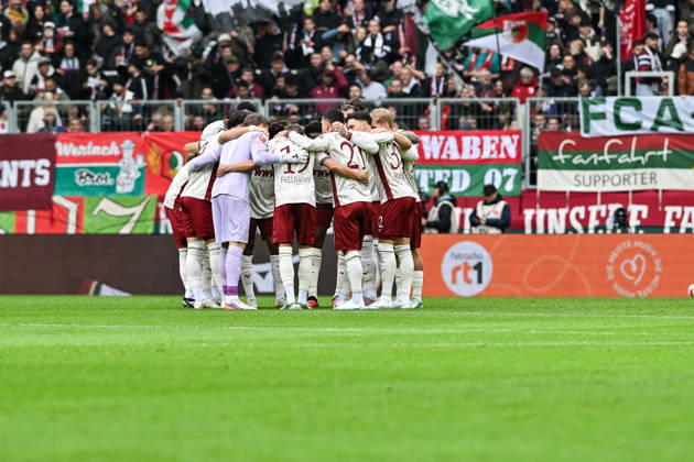 AUGSBURG, GERMANY; 10. OCTOBER: the Team of Augsburg before the Bundesliga Match between FC Augsburg vs. FC Bayern Munich at Matchday 5 at WWK-Arena DFL REGULATIONS PROHIBIT ANY USE OF PHOTOGRAPHS AS IMAGE SEQUENCES AND OR QUASI-VIDEO Copyright: xBEAUTIFULxSPORTS Goldbergx