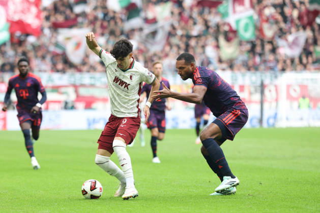 Rodrigo Ribeiro (FC Augsburg, 09) mit Ball mit Jonathan Tah (FC Bayern Muenchen, 04), GER, FC Augsburg vs. FC Bayern Muenchen, Fussball, Bundesliga, 5. Spieltag, Saison 2026 2027, 10.10.2026, DFL DFB REGULATIONS PROHIBIT ANY USE OF PHOTOGRAPHS as IMAGE SEQUENCES and or QUASI-VIDEO, GER, FC Augsburg vs. FC Bayern Muenchen, Fussball, Bundesliga, 5. Spieltag, Saison 2026 2027, 10.10.2026 Augsburg Copyright: xEibner-Pressefoto JennixMaulx EP_JML