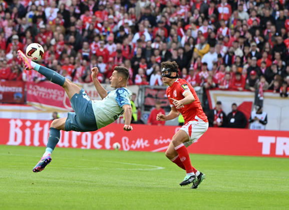 Fussball-Bundesliga - Saison 2026 2027 Mewa-Arena Mainz - 10.10.2026 1. FSV Mainz 05 (mz) - Bayer Leverkusen (lev) Patrik SCHICK (Bayer Leverkusen), li - Fabio GRUBER (mz) DFL REGULATIONS PROHIBIT ANY USE OF PHOTOGRAPHS AS IMAGE SEQUENCES AND OR QUASI VIDEO EDITORIAL USE ONLY NATIONAL AND INTERNATIONAL NEWS AGENCIES OUT Fussball-Bundesliga - 1. FSV Mainz 05