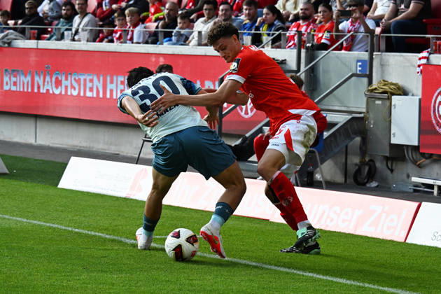 10.10.2026, xsltx, Fussball 1.Bundesliga, FSV Mainz 05 - Bayer 04 Leverkusen v.l. Ibrahim Maza (Bayer 04 Leverkusen) Eric Martel (FSV Mainz 05) Zweikampf, Aktion, action, battle for the ball (DFL DFB REGULATIONS PROHIBIT ANY USE OF PHOTOGRAPHS as IMAGE SEQUENCES and or QUASI-VIDEO) Mainz